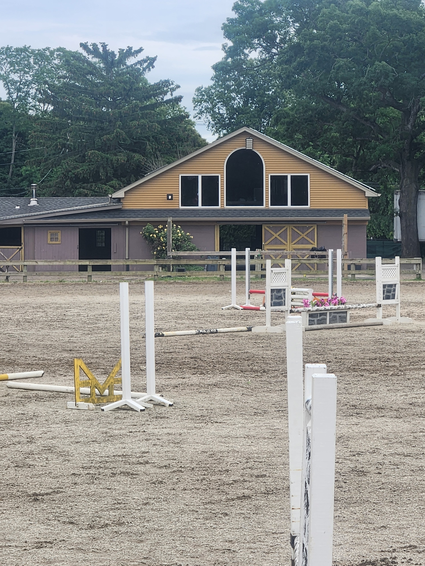 The 120x240 GGT outdoor ring at Rising Talent Equestrian